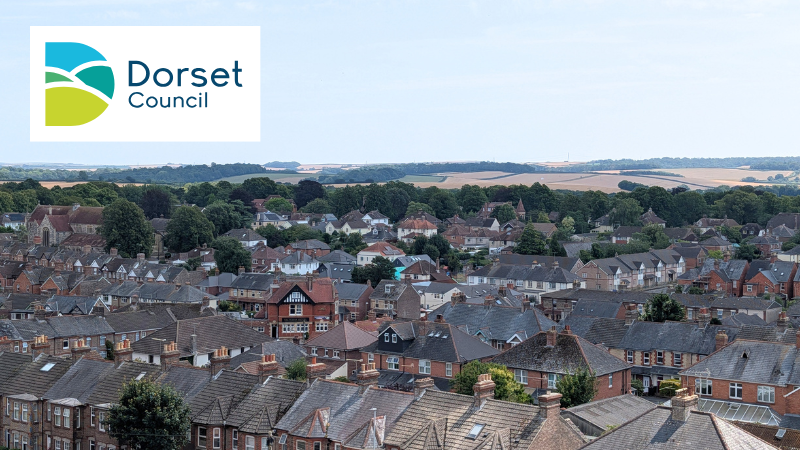 View of Dorset town with low hills in background